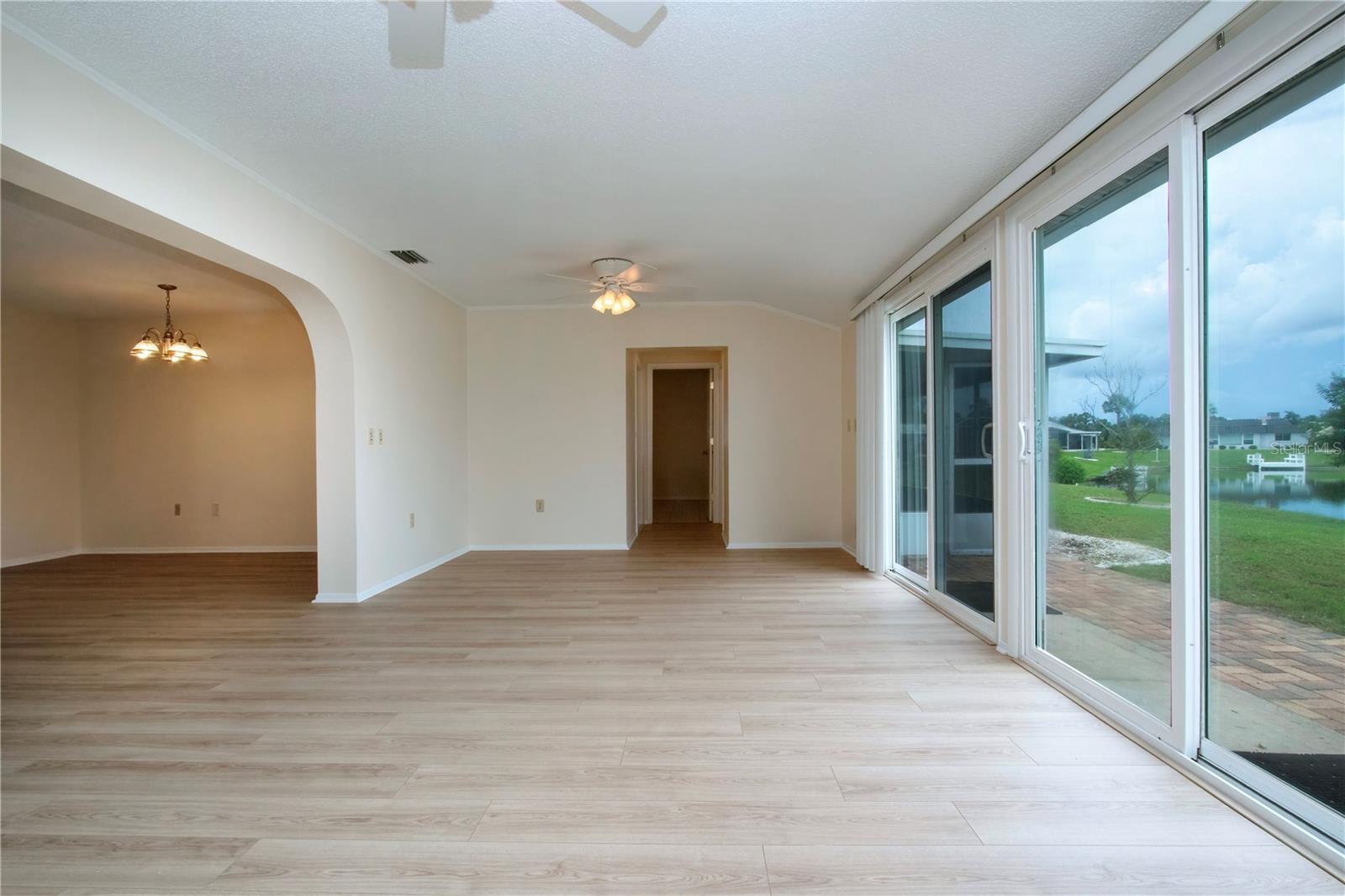 Entry to back hallway to bedroom 3 and screened porch