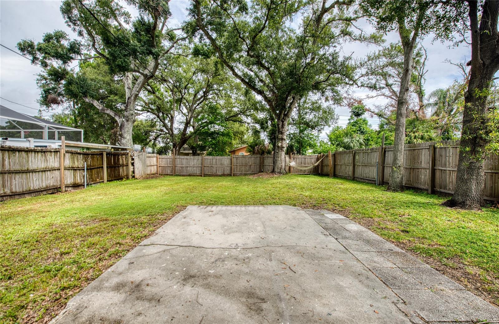 Fenced Backyard w/ Concrete Slab
