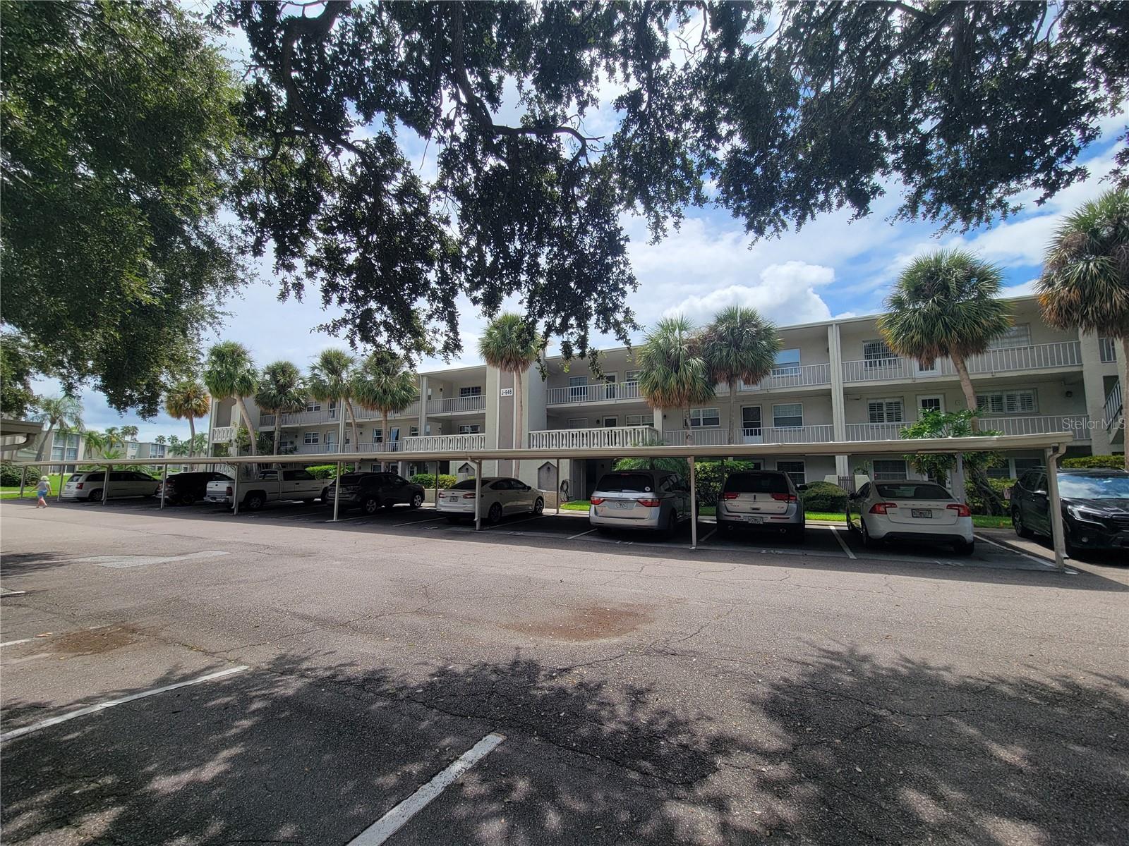 Covered parking in front of the elevator entrance