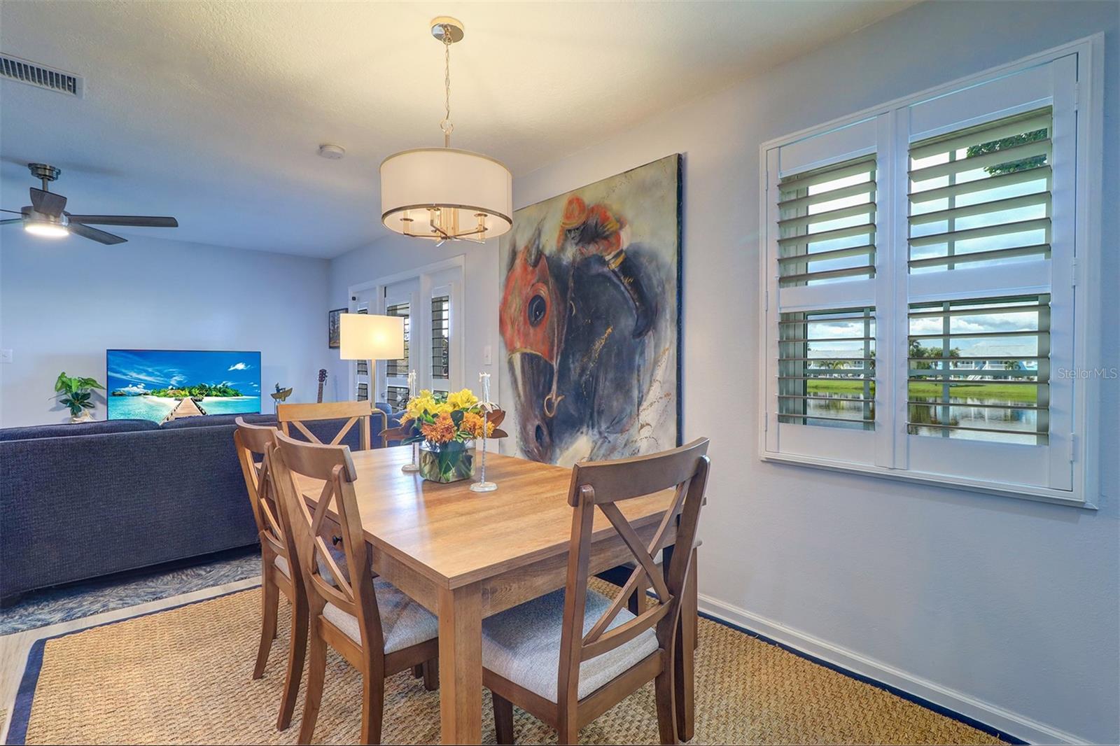 Don't miss the custom plantation shutters throughout!