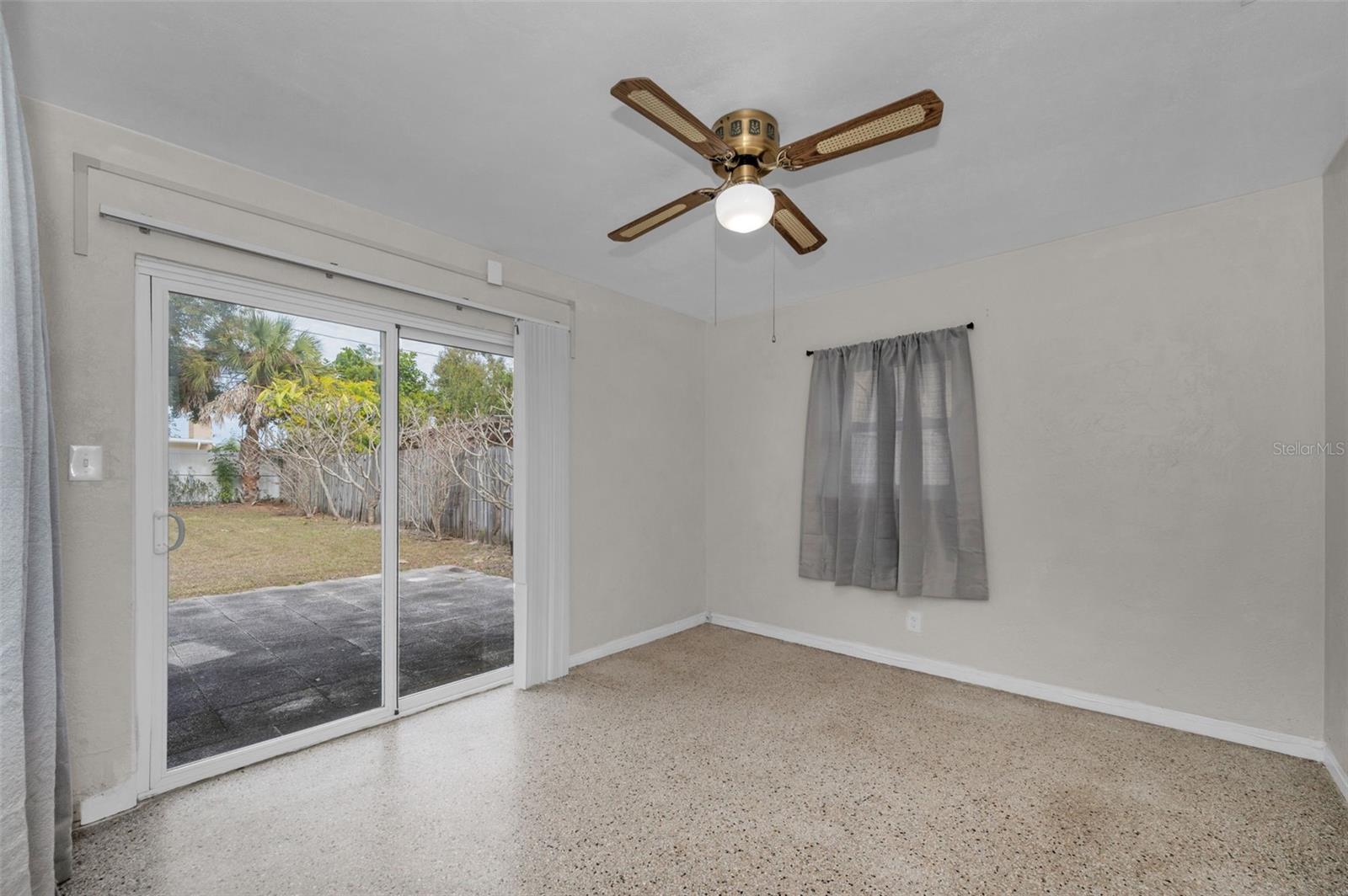 Back bedroom opens to back yard. Can you see your pool or jacuzzi right there??