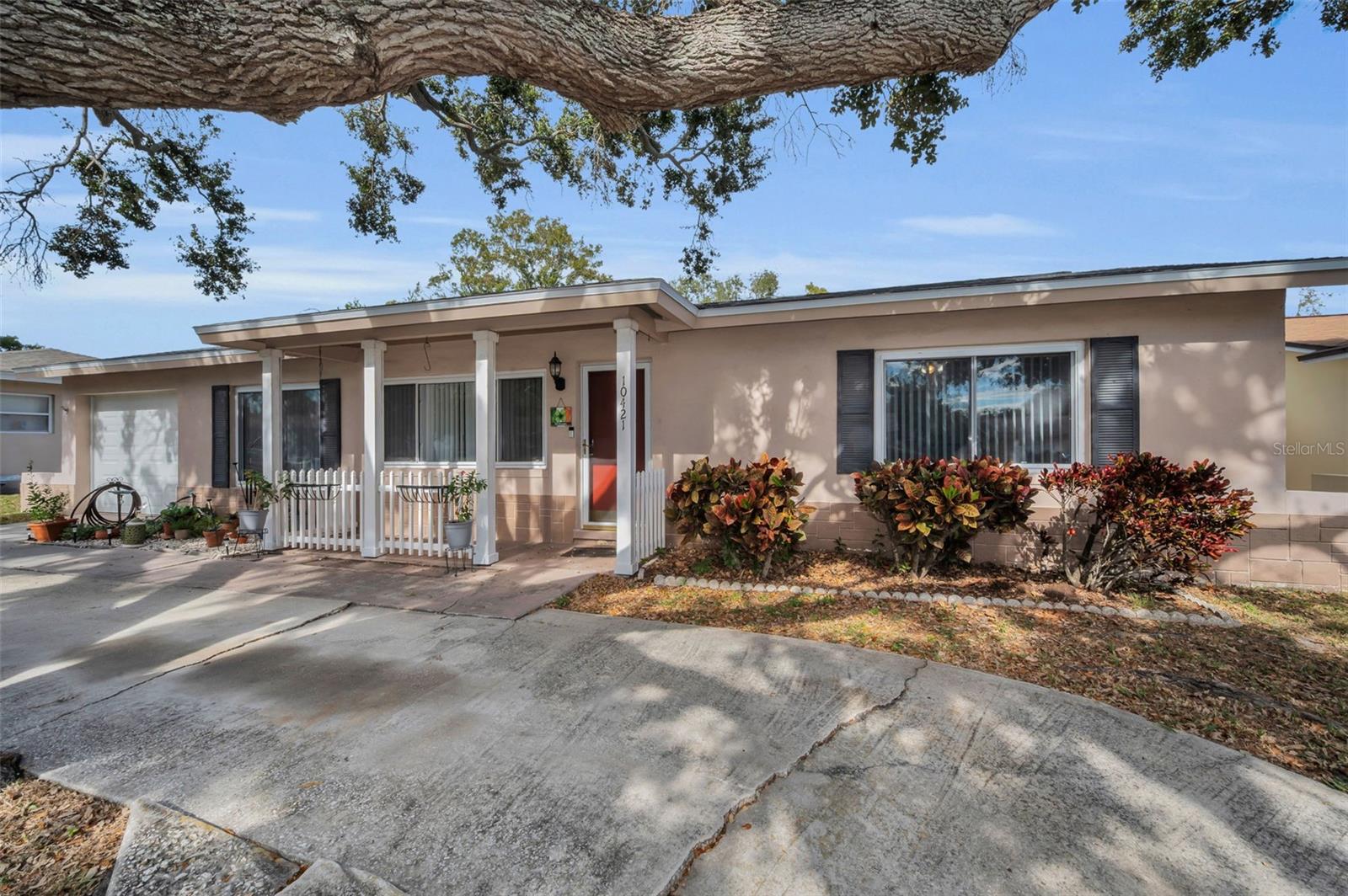 Cute little front porch to watch the world go by...or the kids playing
