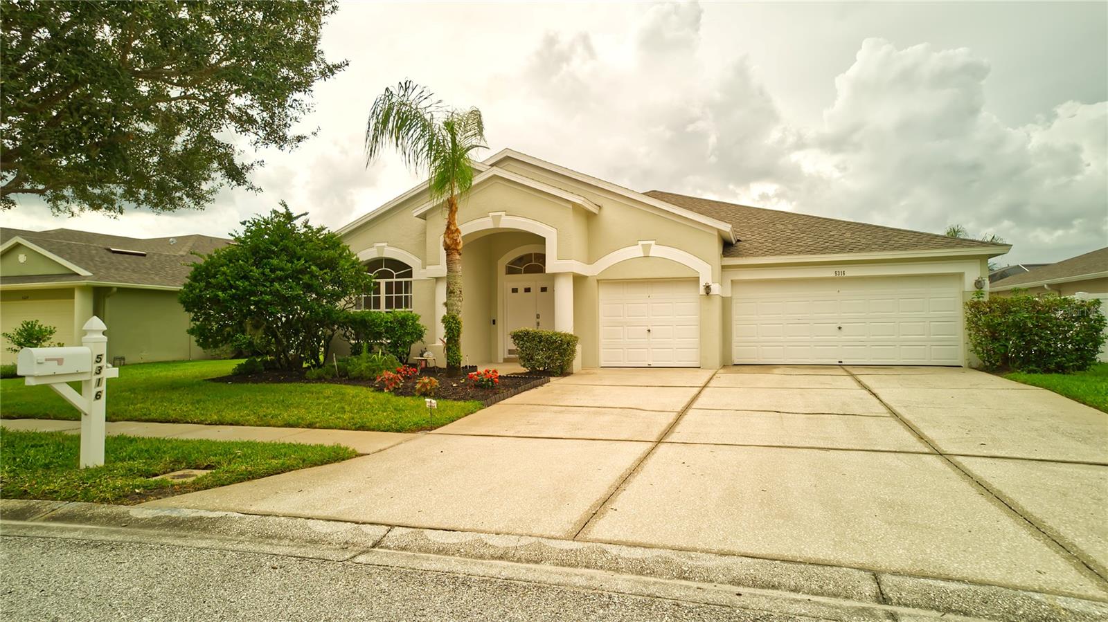 Spacious driveway and 3 car garage to house your vehicles