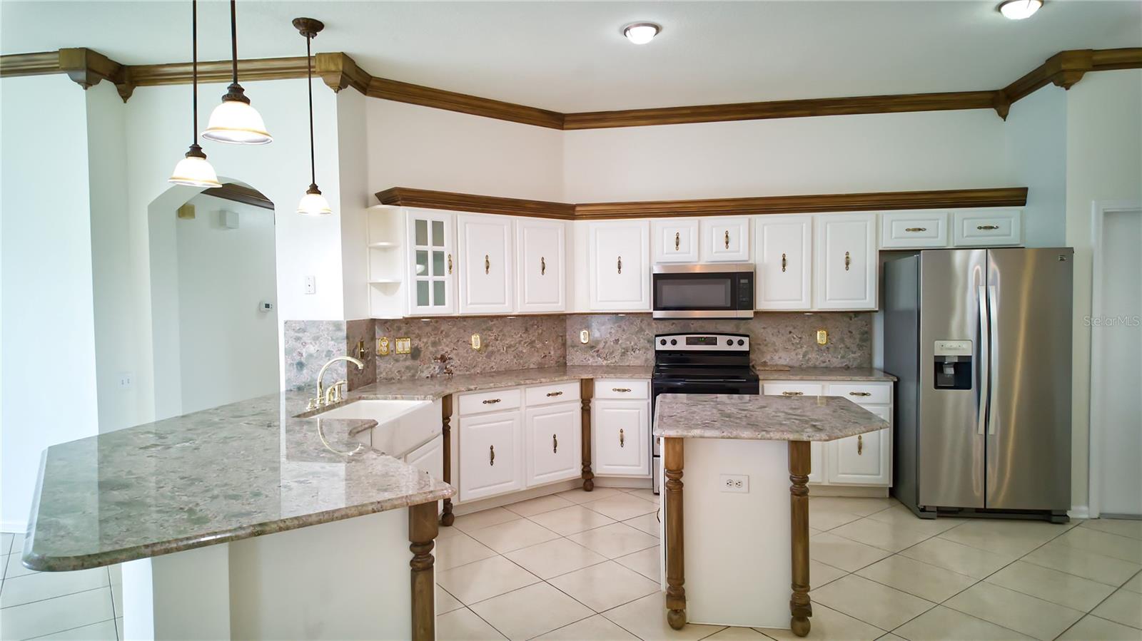 Exquisite Crown Molding throughout the kitchen
