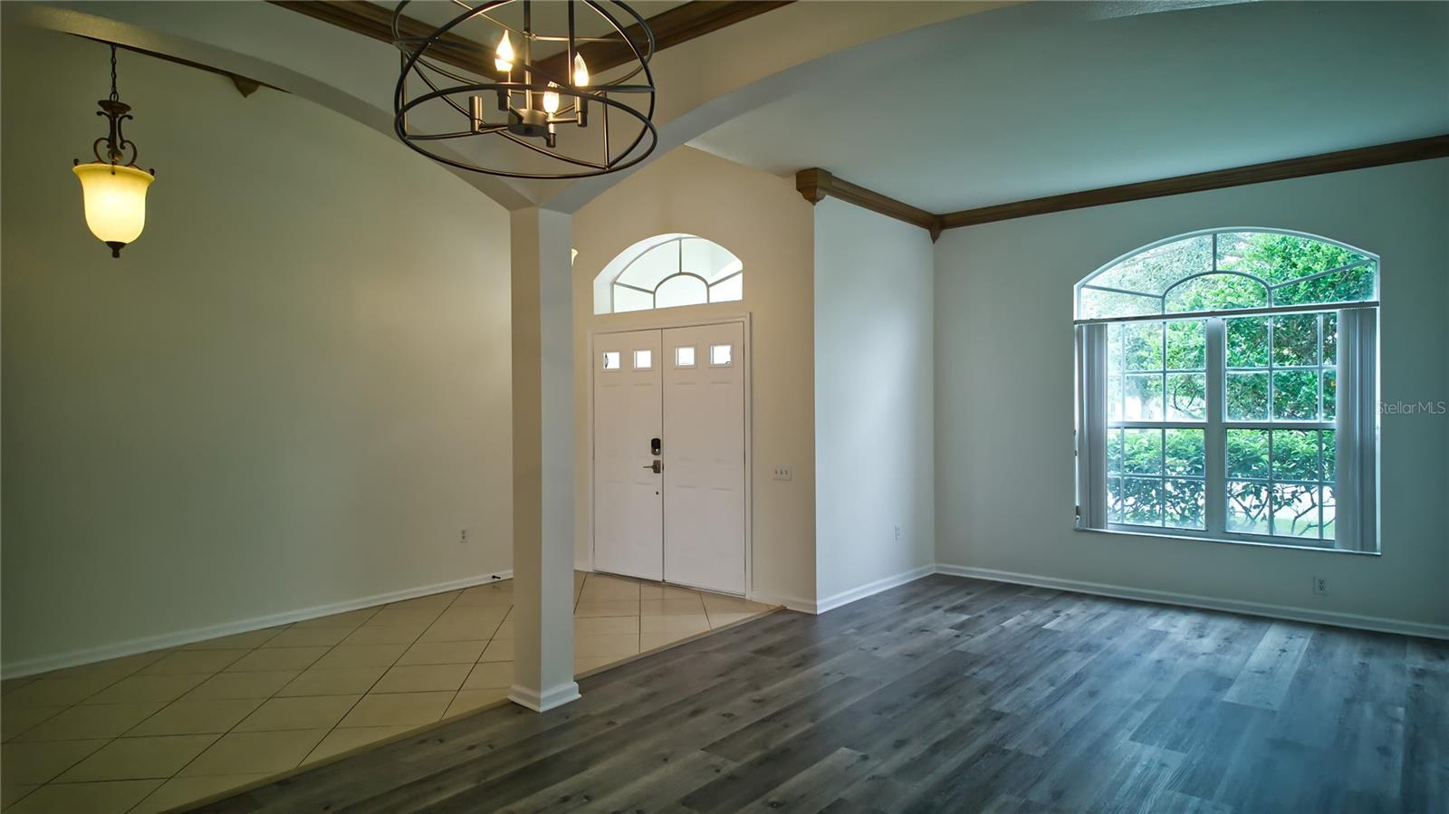 Grand Entry with 15 foot ceilings and formal living room
