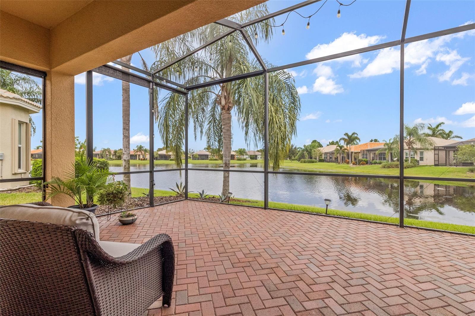 Extended Screen Enclosed Lanai with view of Lake & Sunset