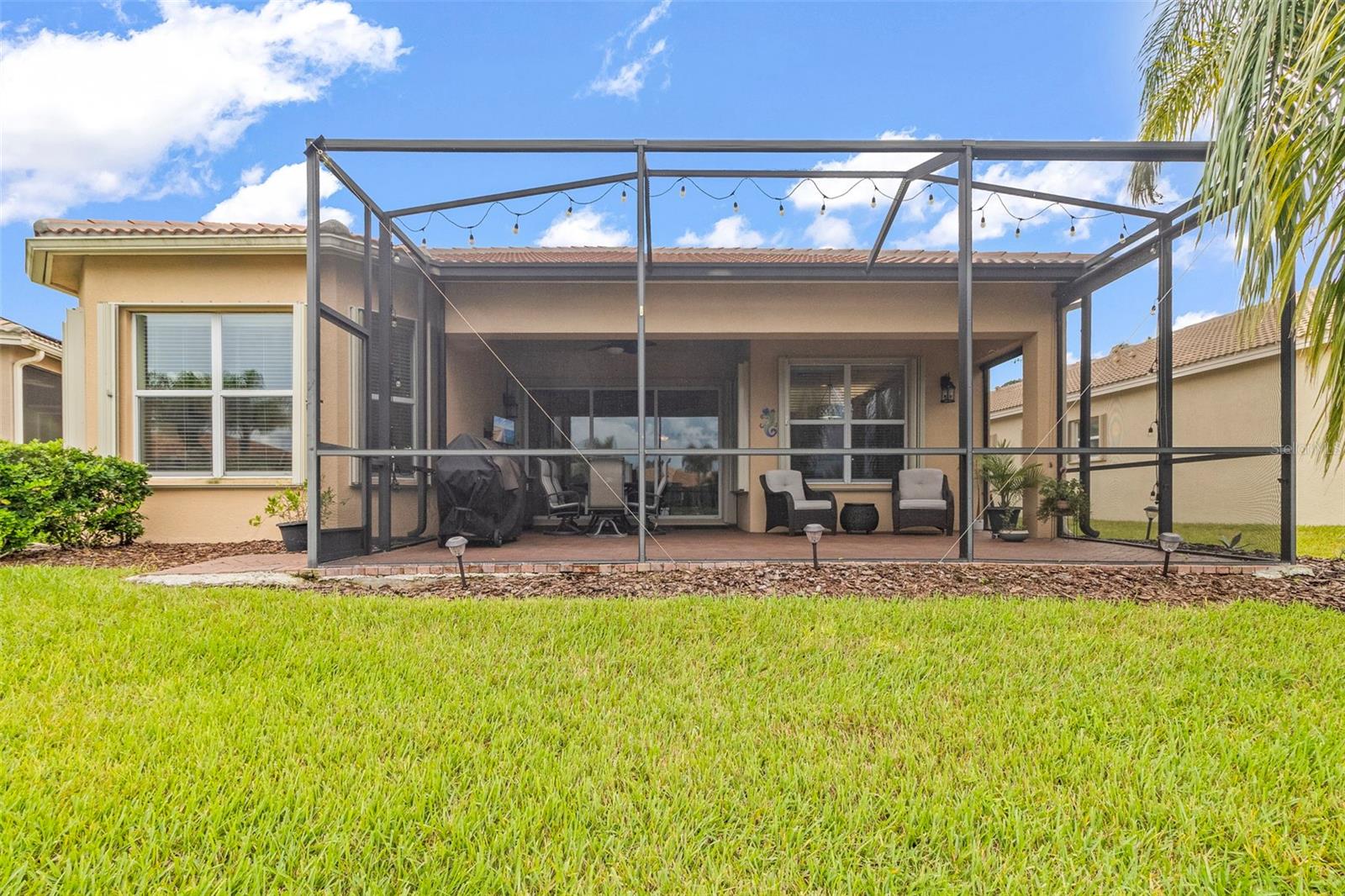 Extended Screen Enclosed Lanai with view of Lake & Sunset
