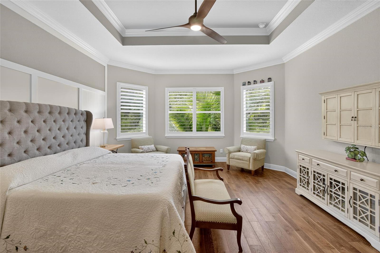 Primary Bedroom Suite w/Coffered Ceiling & Built-In TV Cabinet