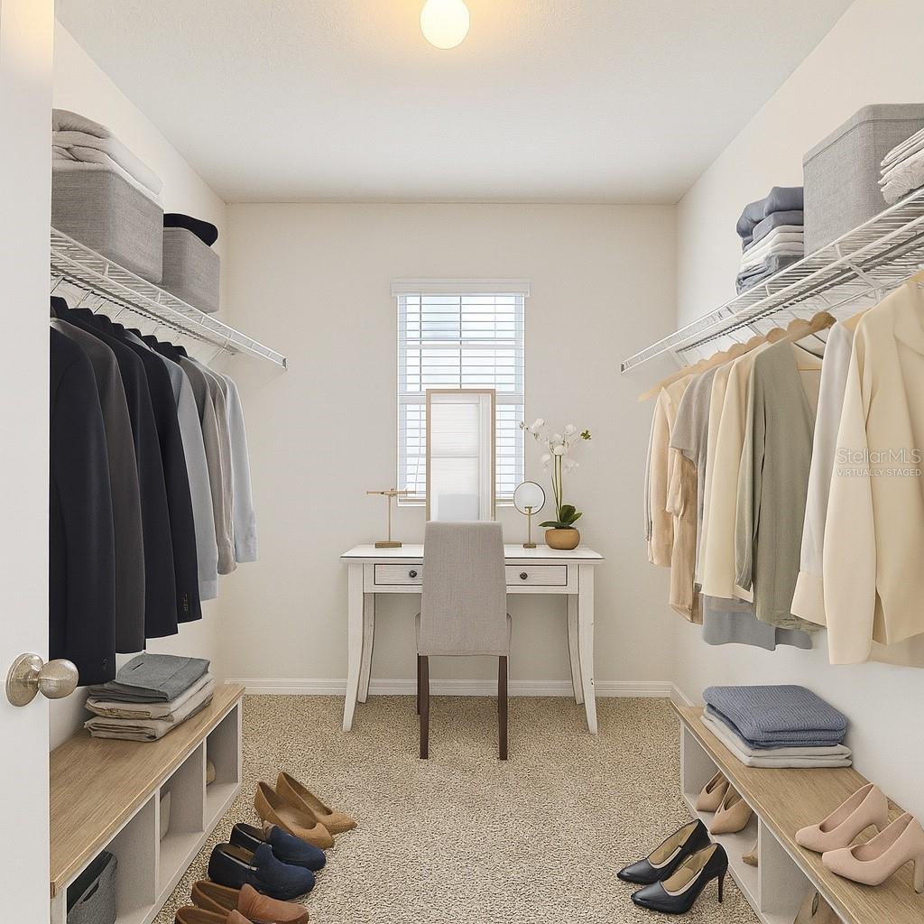 Primary Walk-in Closet- Virtually Staged