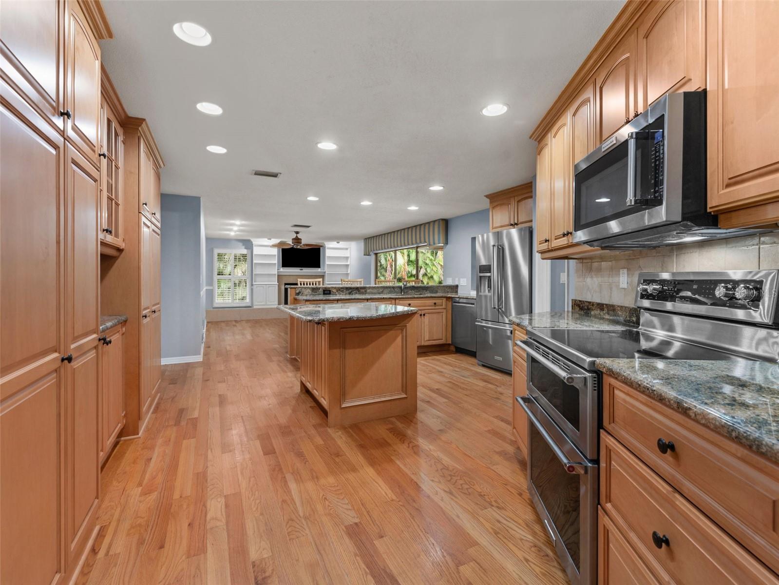 A chef’s dream kitchen with abundant cabinets and storage