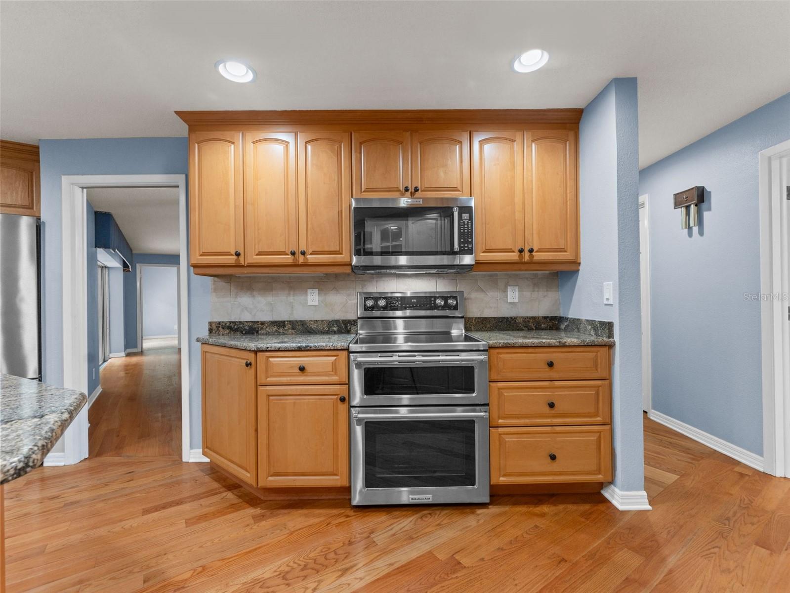 Top-of-the-line KitchenAid appliances bring style and performance to this kitchen.