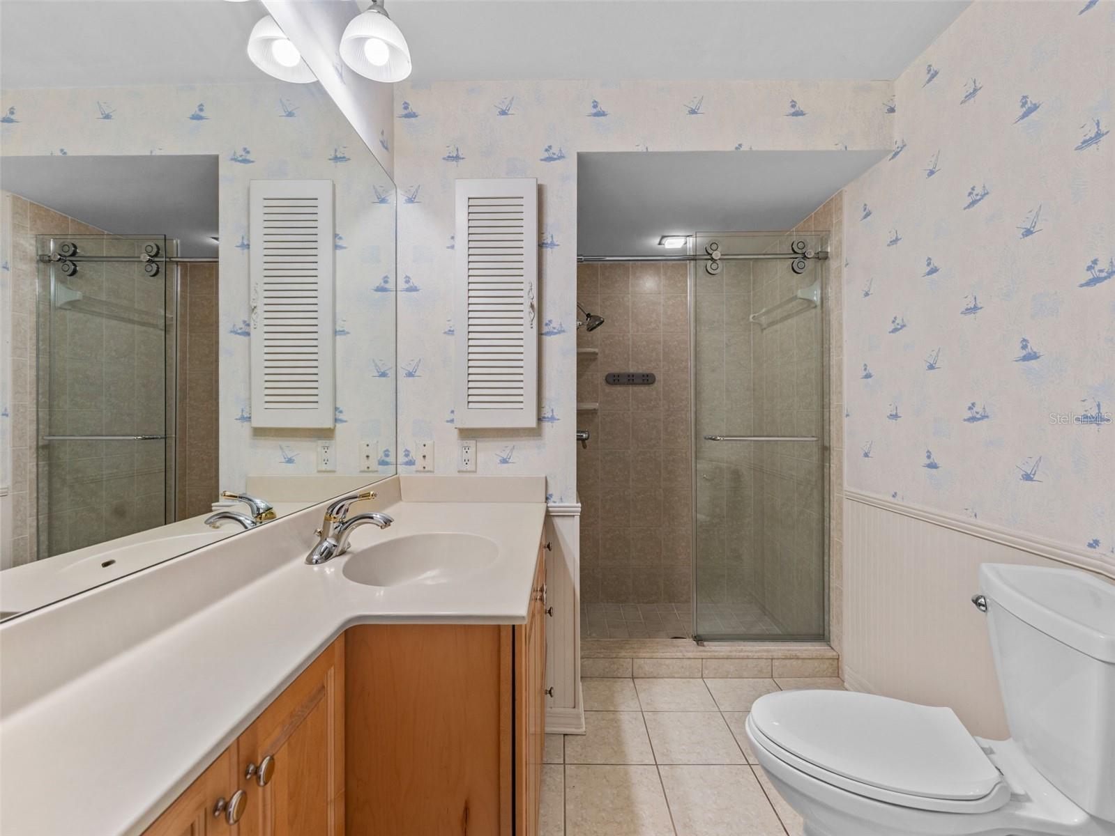Updated hall bath offering convenience for family and guests alike