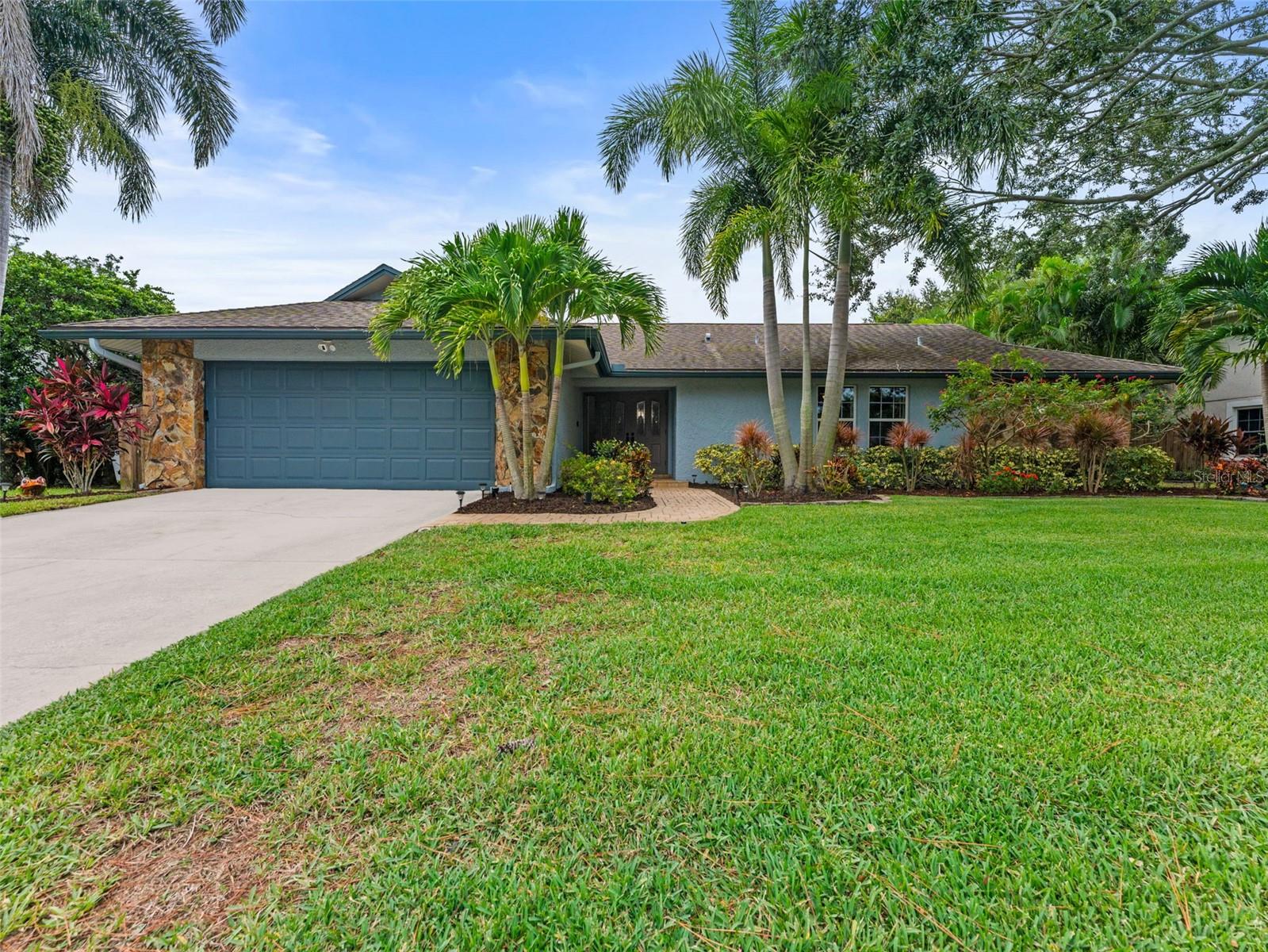 Meticulously landscaped front yard that enhances the home’s curb appeal