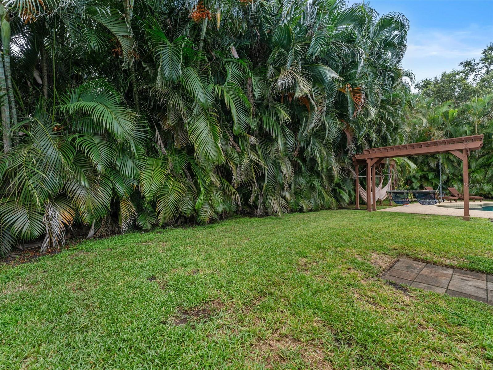 Relax and unwind in a private backyard with plenty of open space