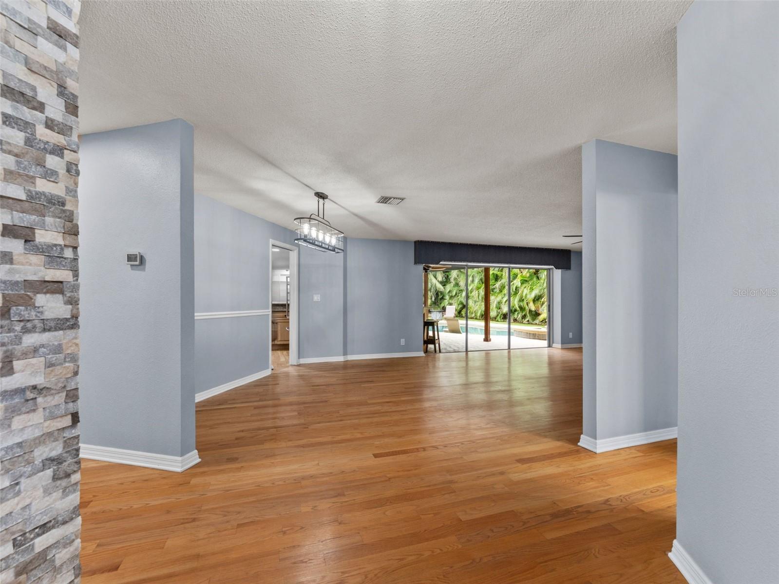 Step inside to an open foyer flowing seamlessly into the dining and living areas