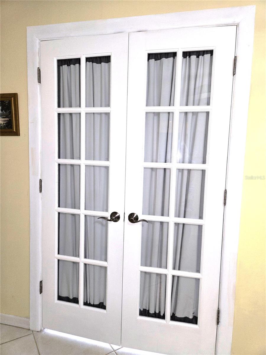 French Doors leading to the Primary Bedroom