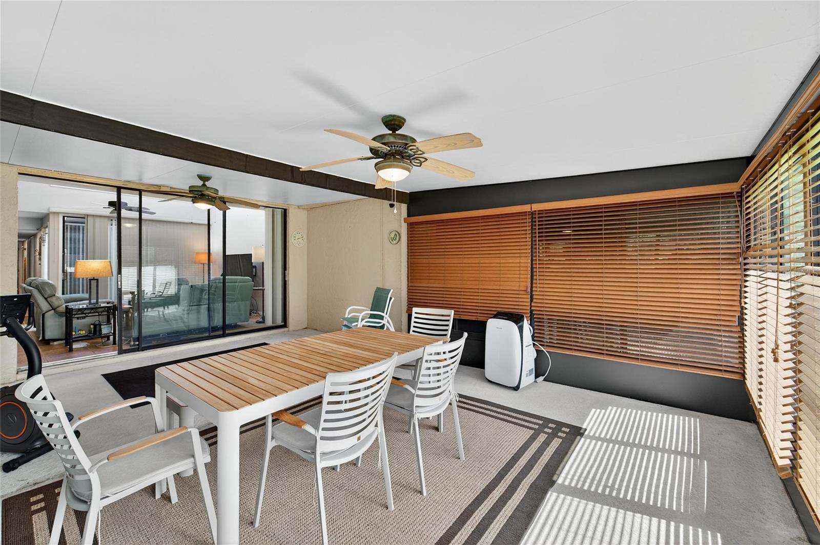 Lanai with Ceiling Fans and Shades