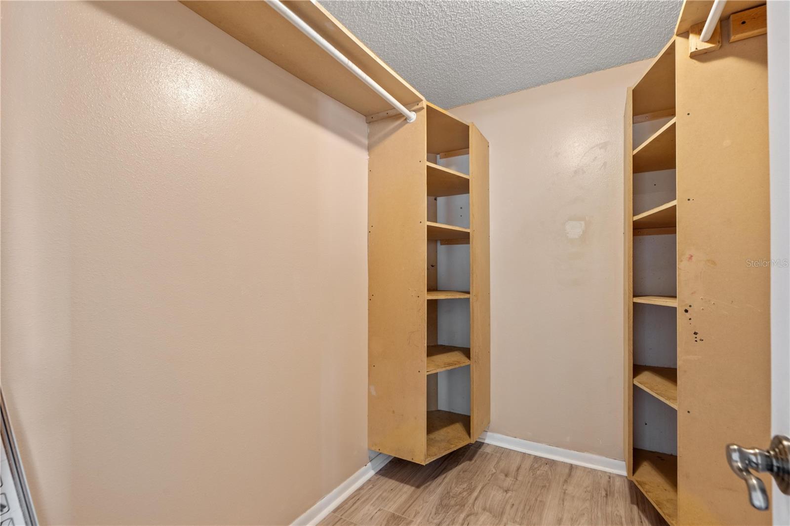 Primary Bedroom walk in closet