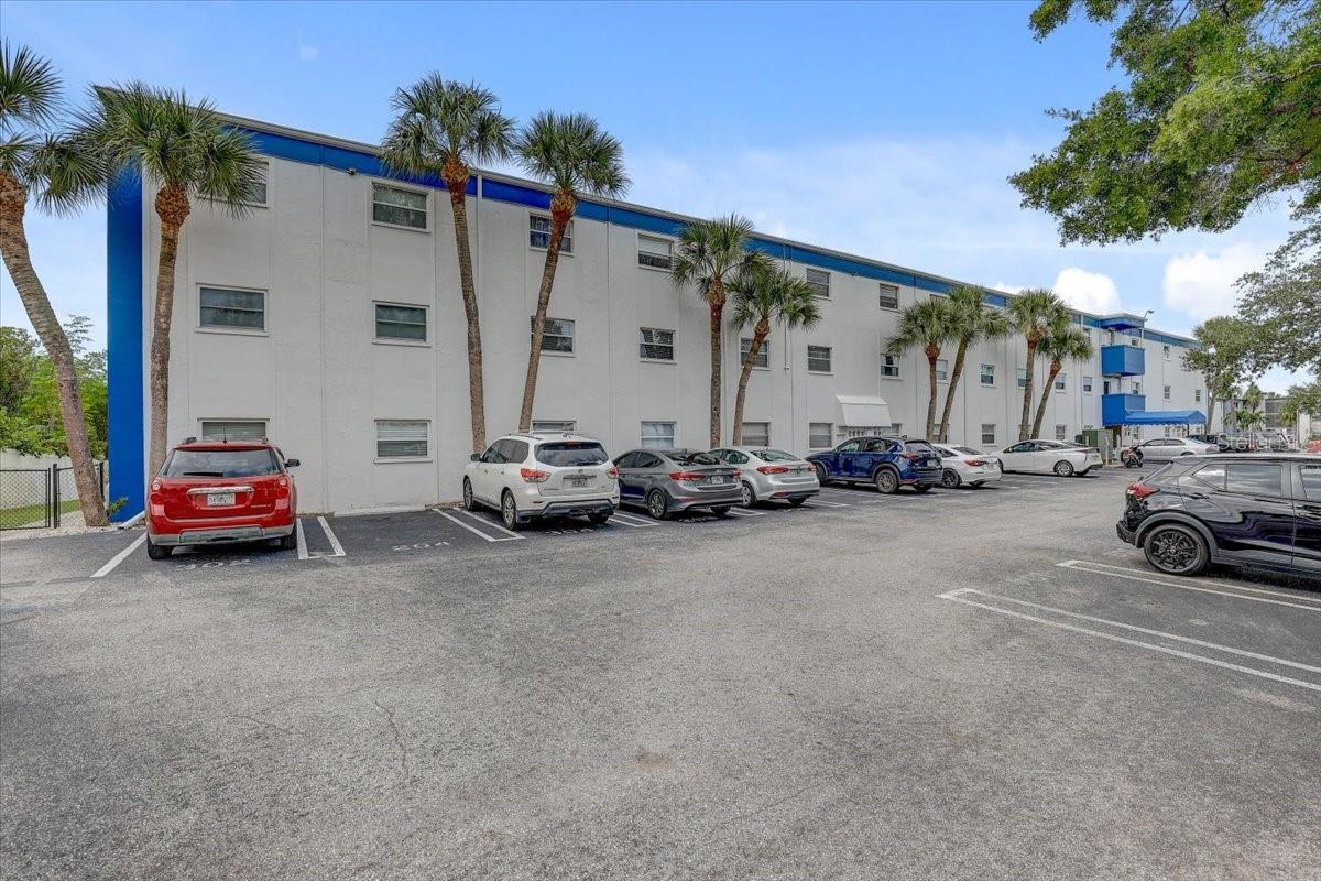 Assigned parking close to unit #204 with guest parking on the south side of the building.