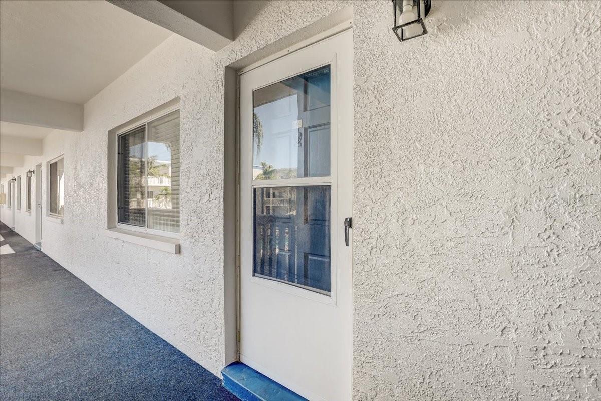 Front door entry to unit #204
