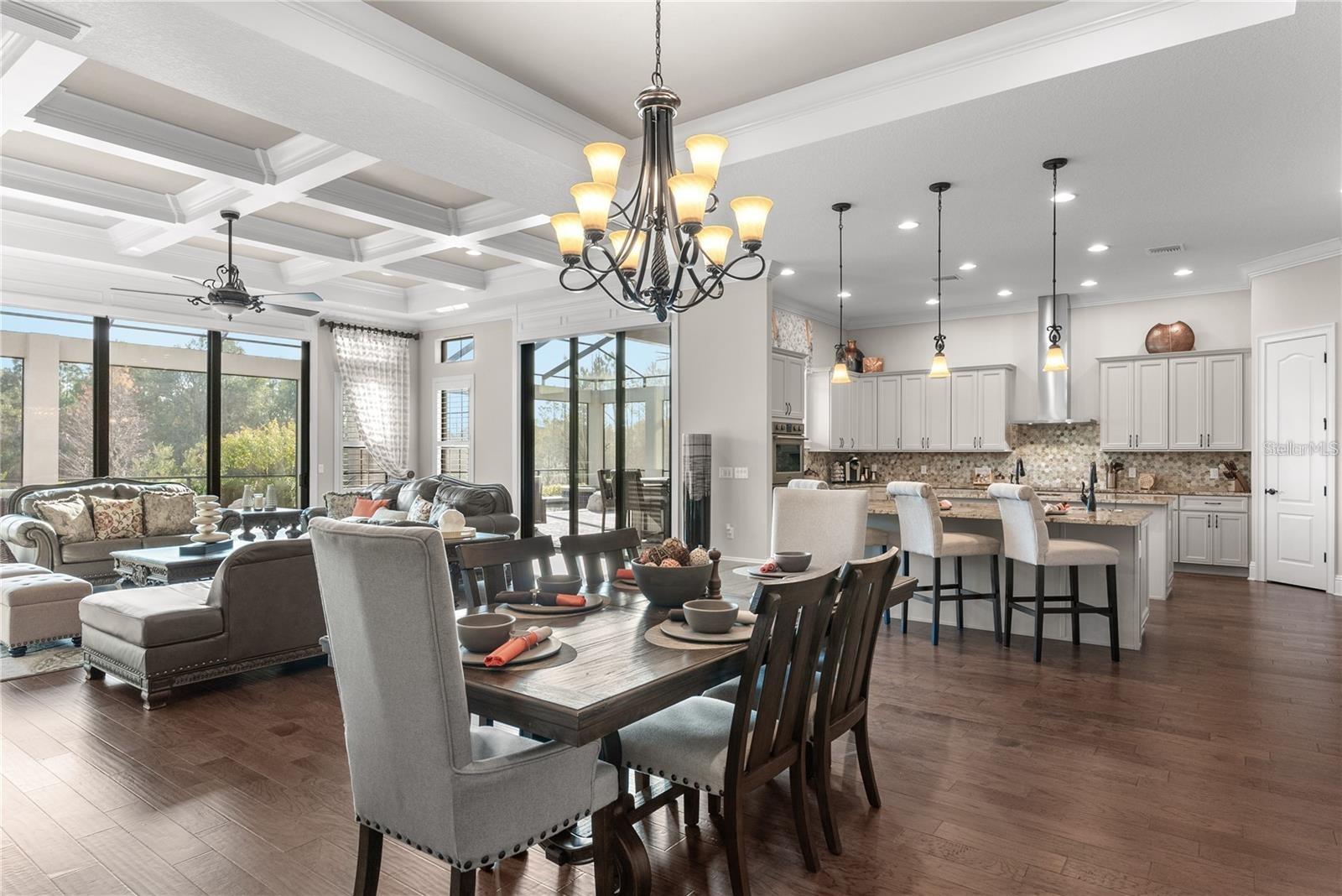Designed for both elegance and functionality, the first floor includes four private suites, a formal dining room, a wine cellar, and an elevator, providing a seamless blend of comfort and sophistication.