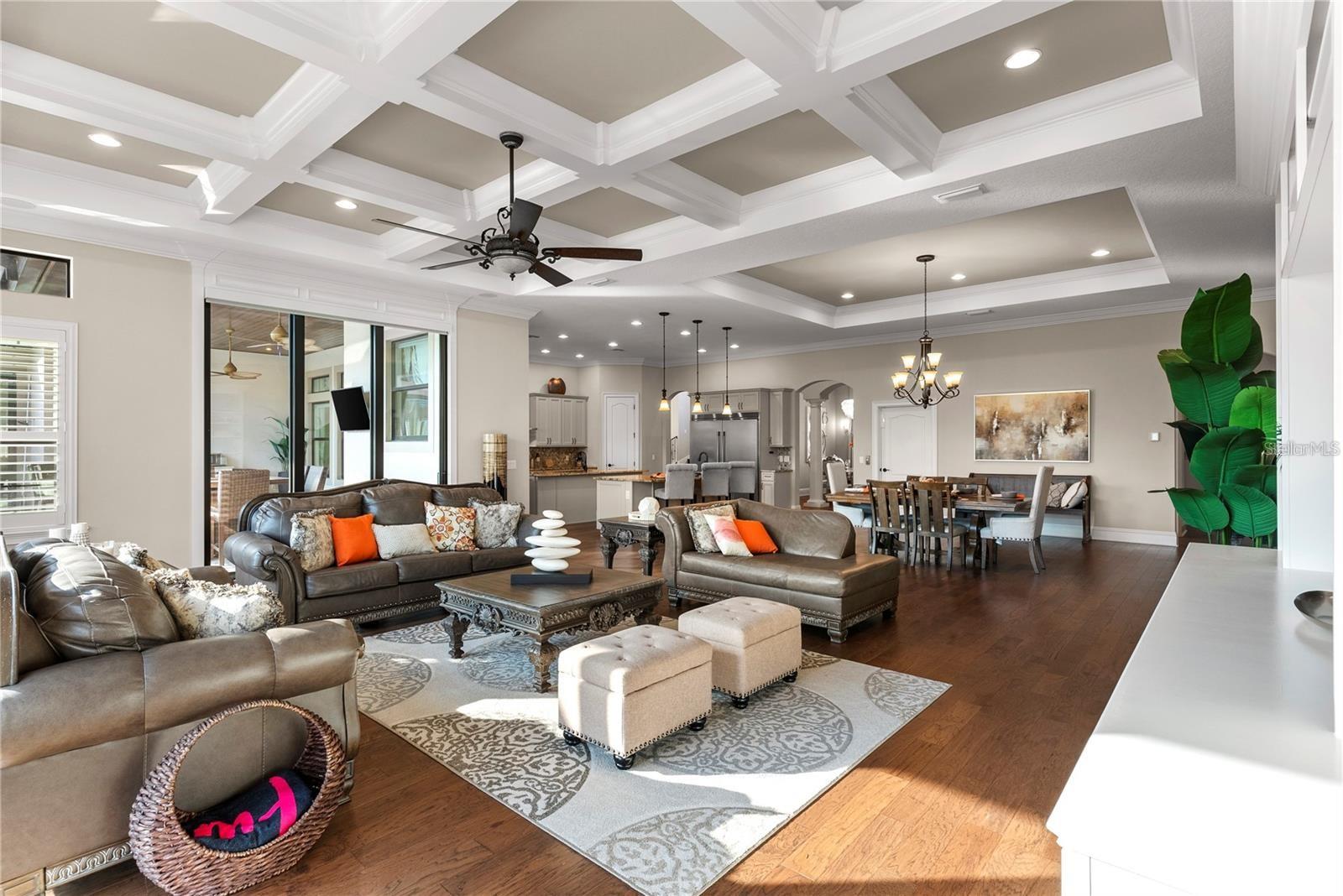 The open-concept family room offers a seamless flow between the kitchen and dining areas.