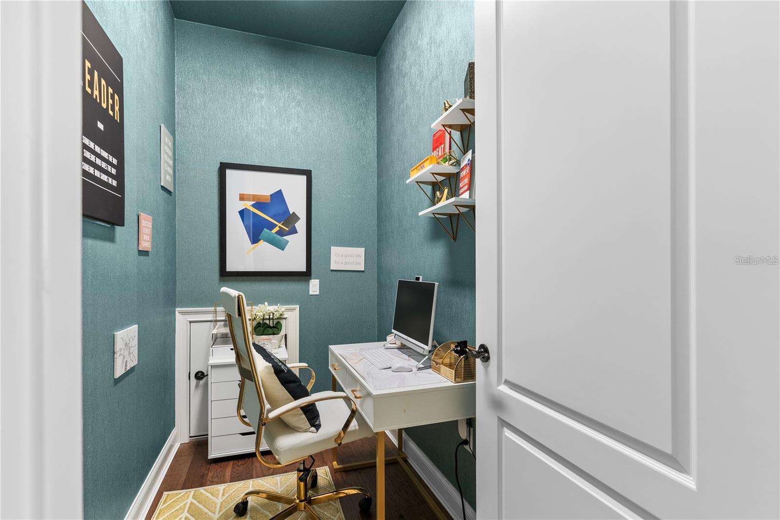 Located upstairs, this private office space is versatile and perfect for the at home professional.