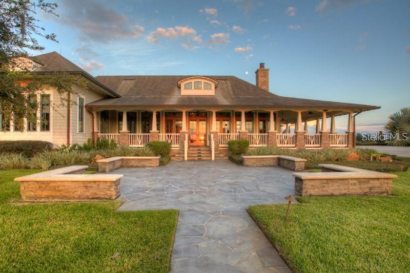 Additional amenities include a playground, tennis courts, half basketball court, RV and boat storage, and five miles of private roads with a 100-foot right-of-way.