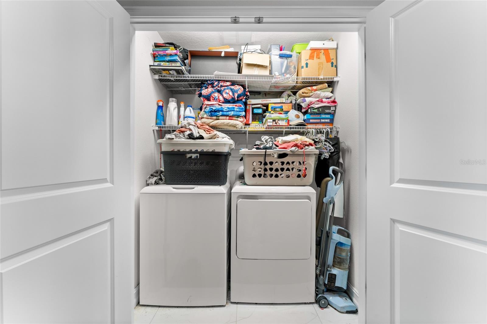 Upper-level laundry space with washer and dryer hookups.