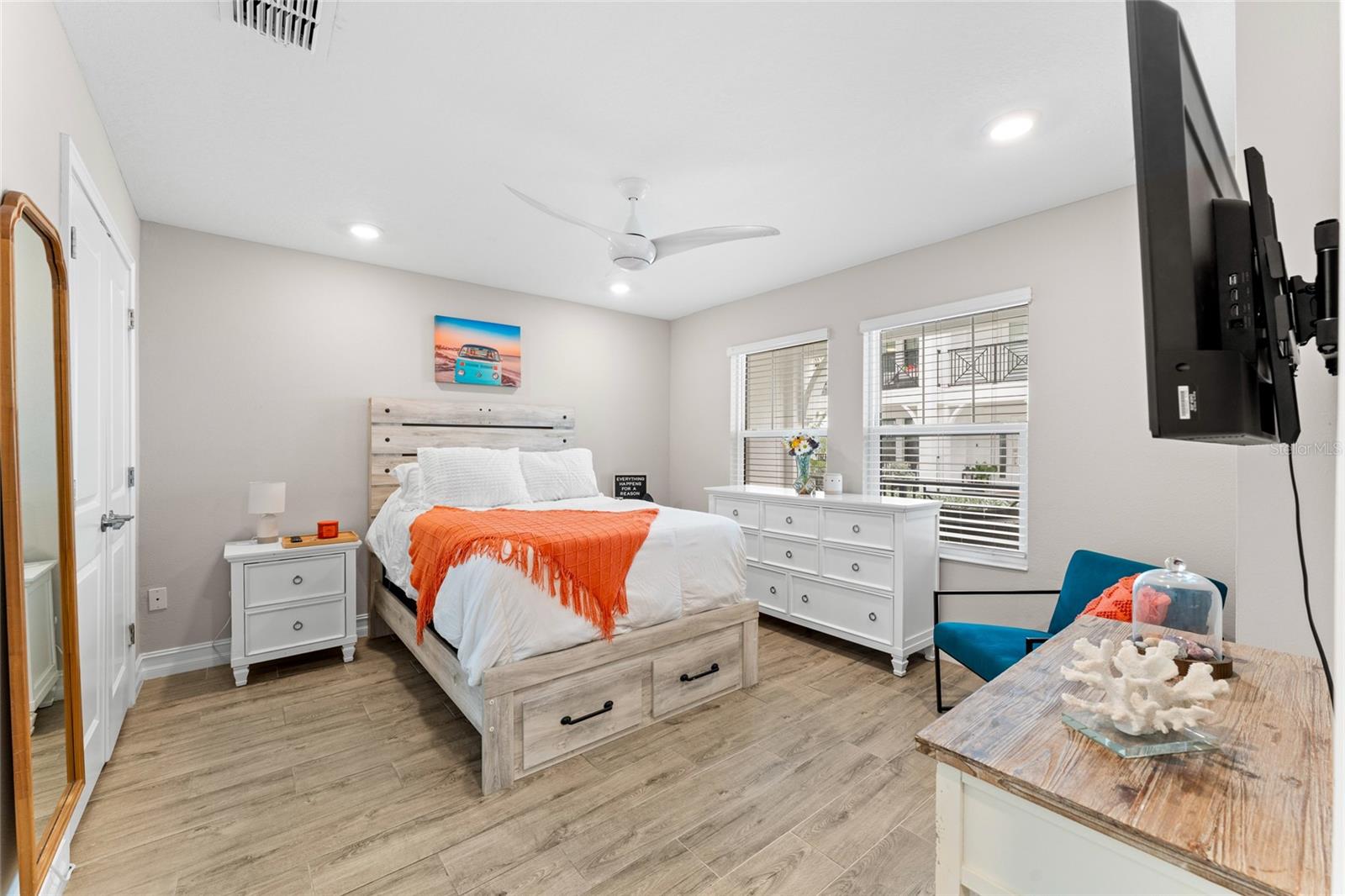 Entry level bedroom with dual built-in closets.