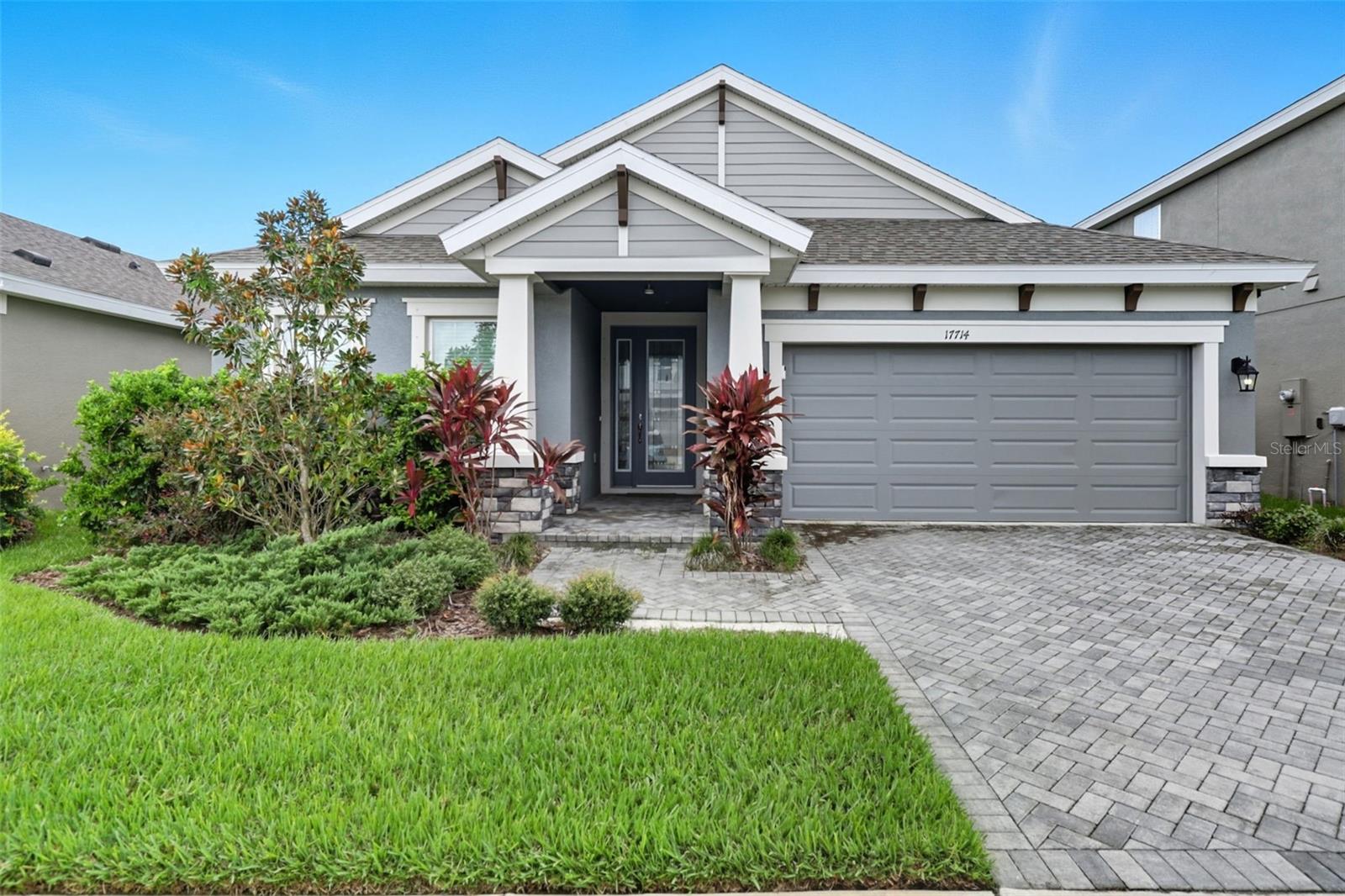 Beautiful, single level waterfront home with wide premium lot.