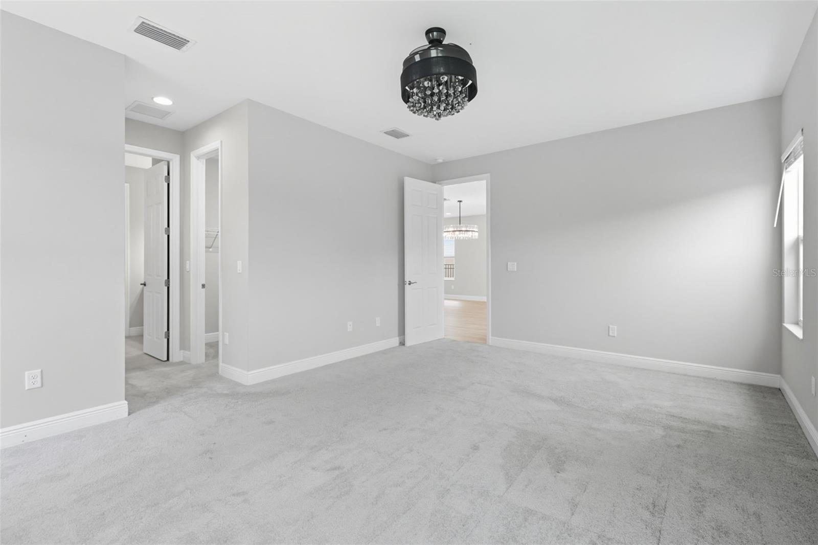 Spacious main level Master suite Bedroom with nature views