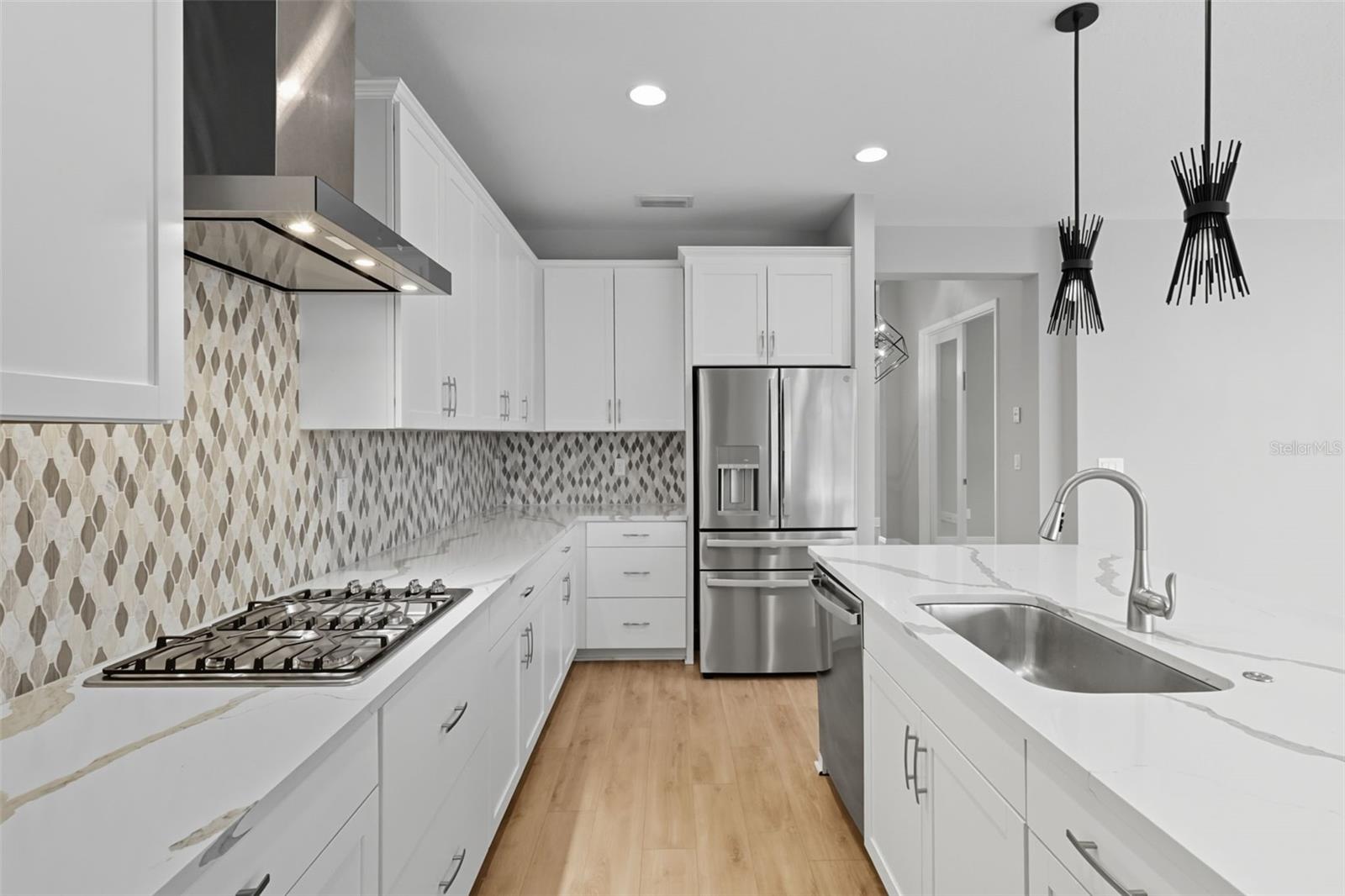 Beautiful upgraded gourmet kitchen with gas range