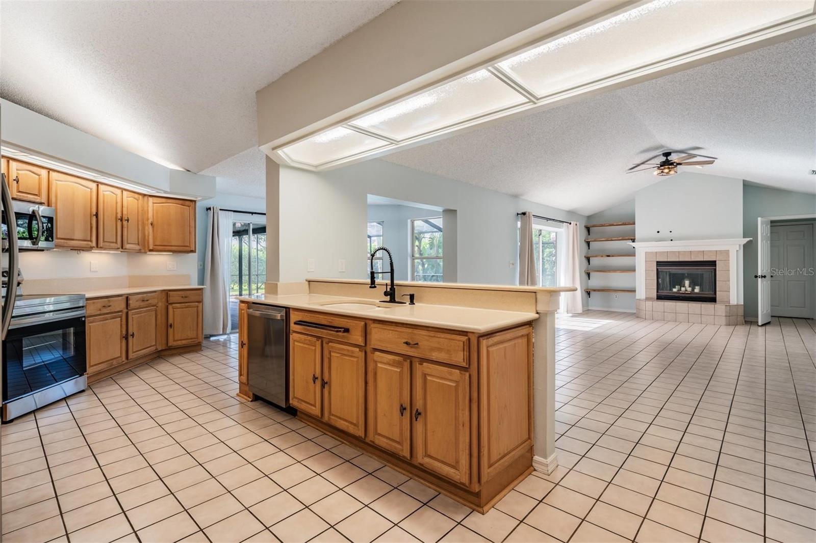 kitchen, breakfast bar & family room