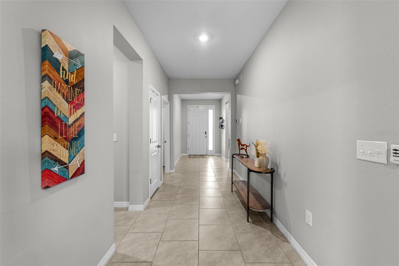 Split concept 2 beds in front of home 3rd in middle of home