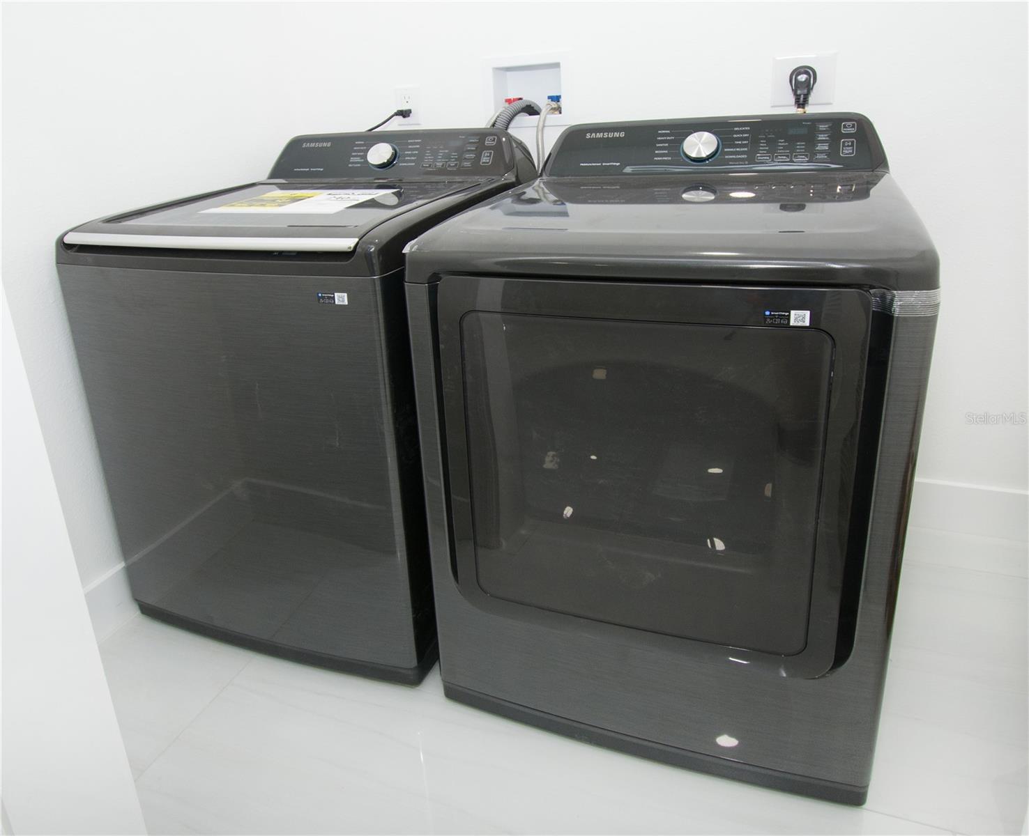 Laundry area with New Washer and Dryer