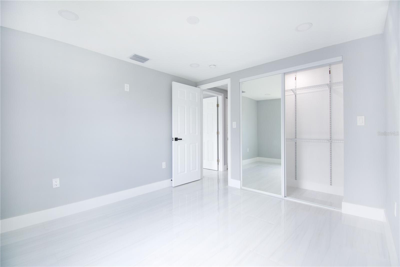 Secondary Bedroom with Natural Light and Closet Space