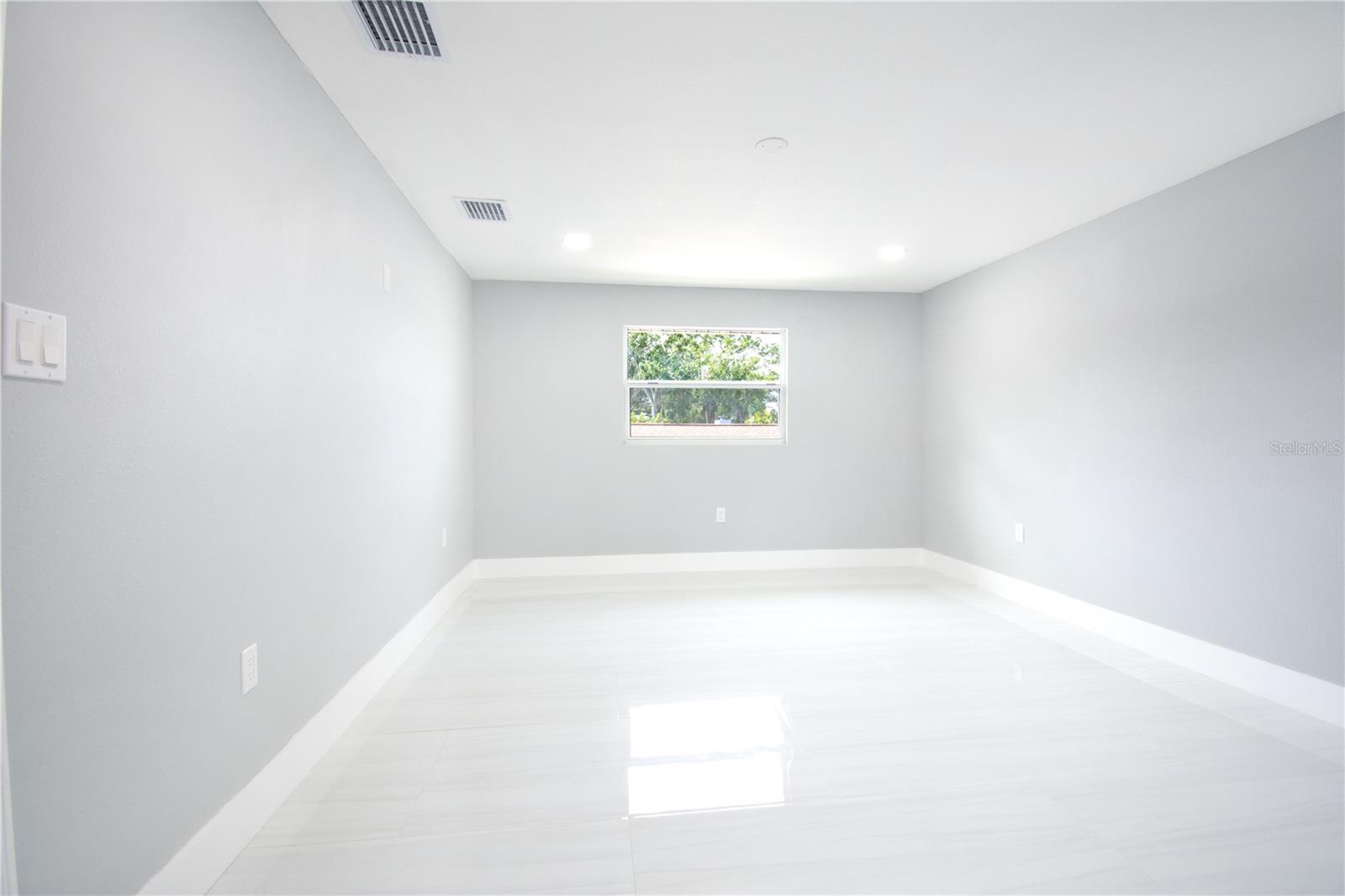 Primary Bedroom with Private Bathroom and Spacious Walking Closet