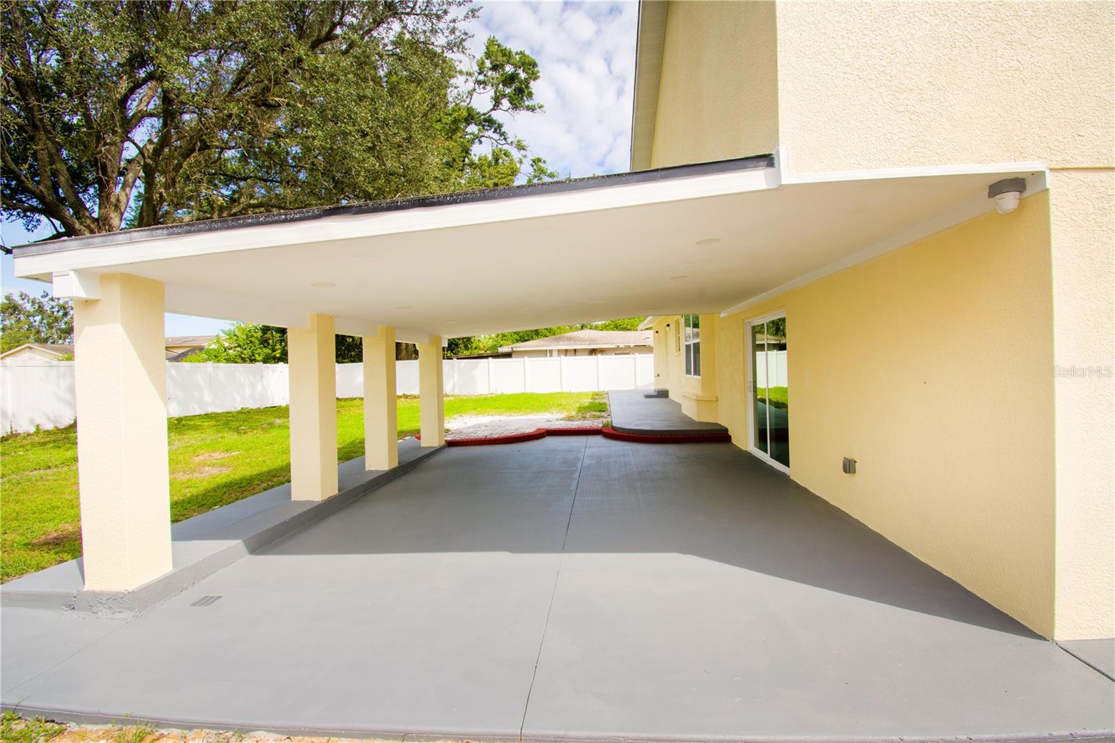 Covered Terrace with Direct Access to the Backyard