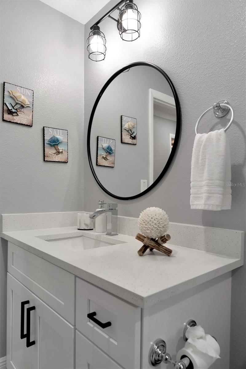 Hall bathroom with updated fixtures & finishes