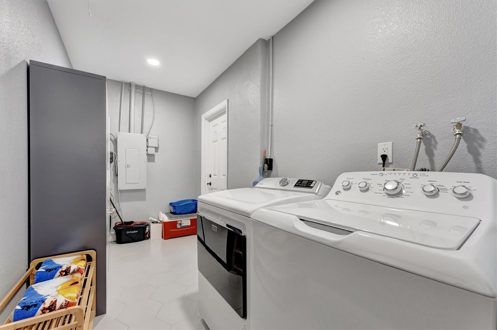 Laundry room with additional storage