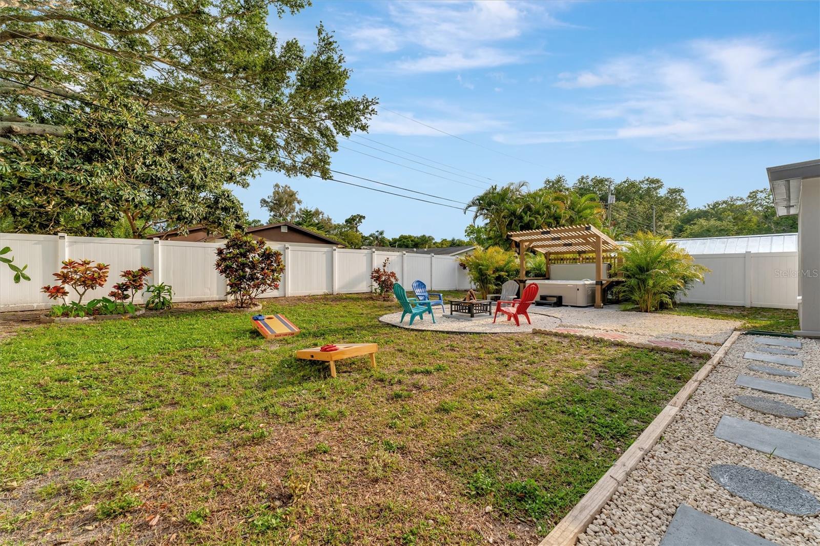 Spacious backyard with lots of green space