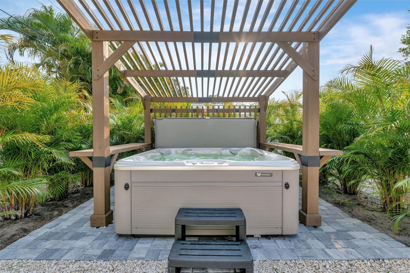 Brand new pergola and landscaping around the hot tub