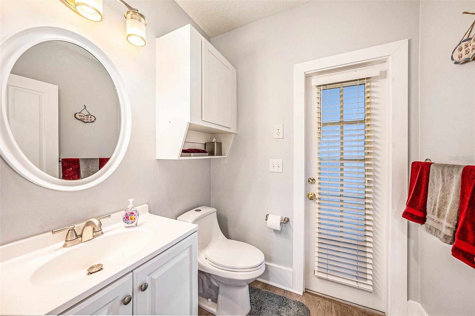 Half bath also with access to pool