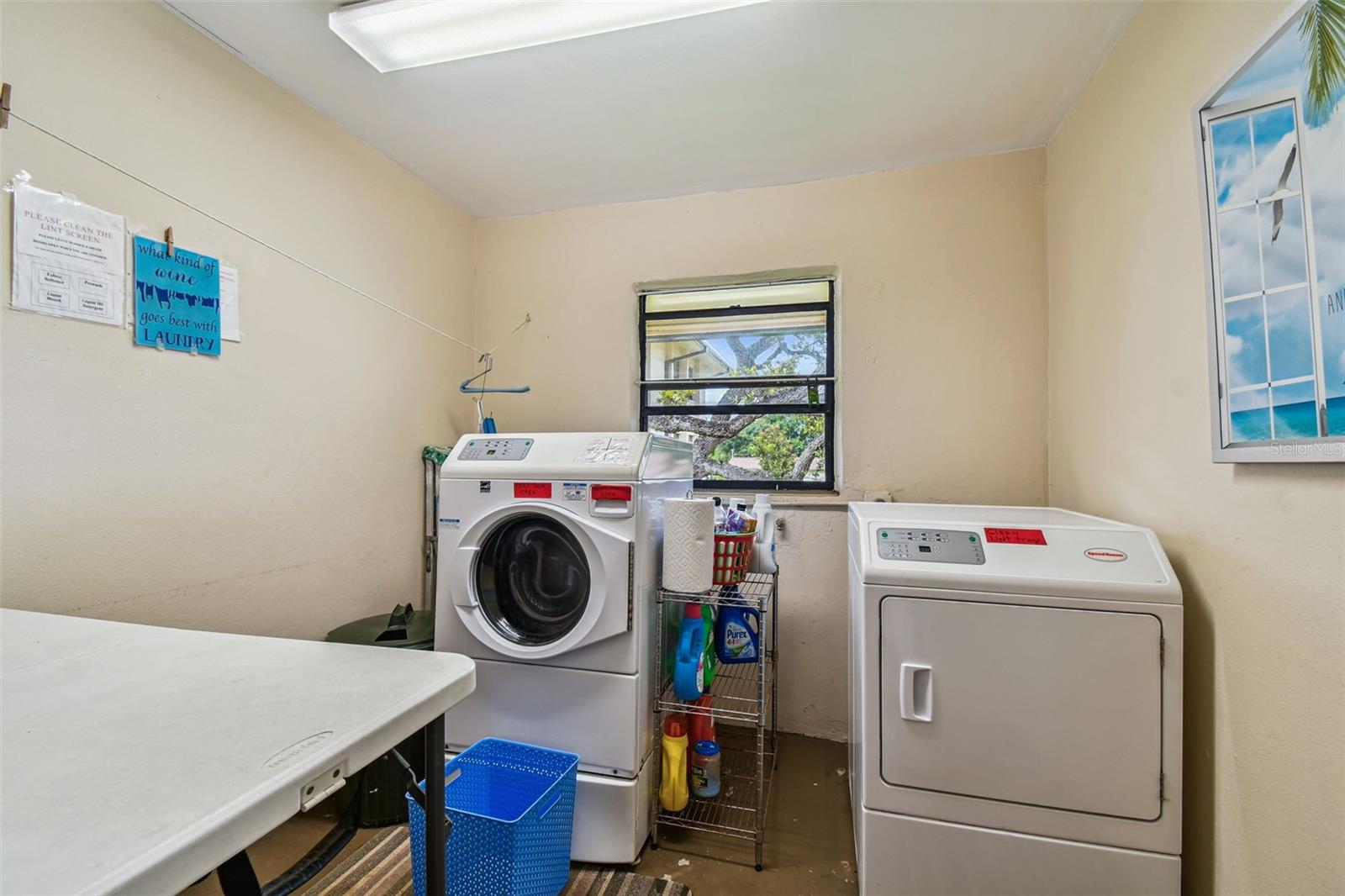Laundry room right outside the unit.