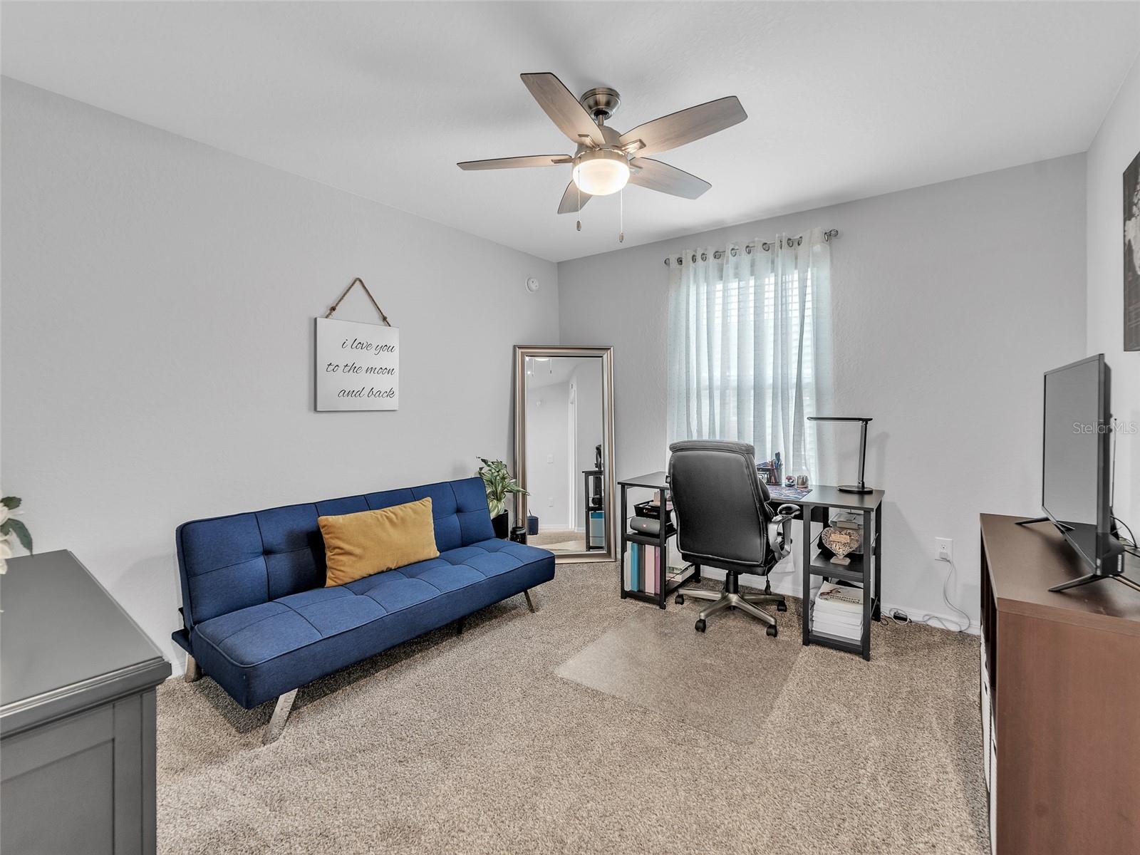Upstairs loft, office or den has a walk-in closet