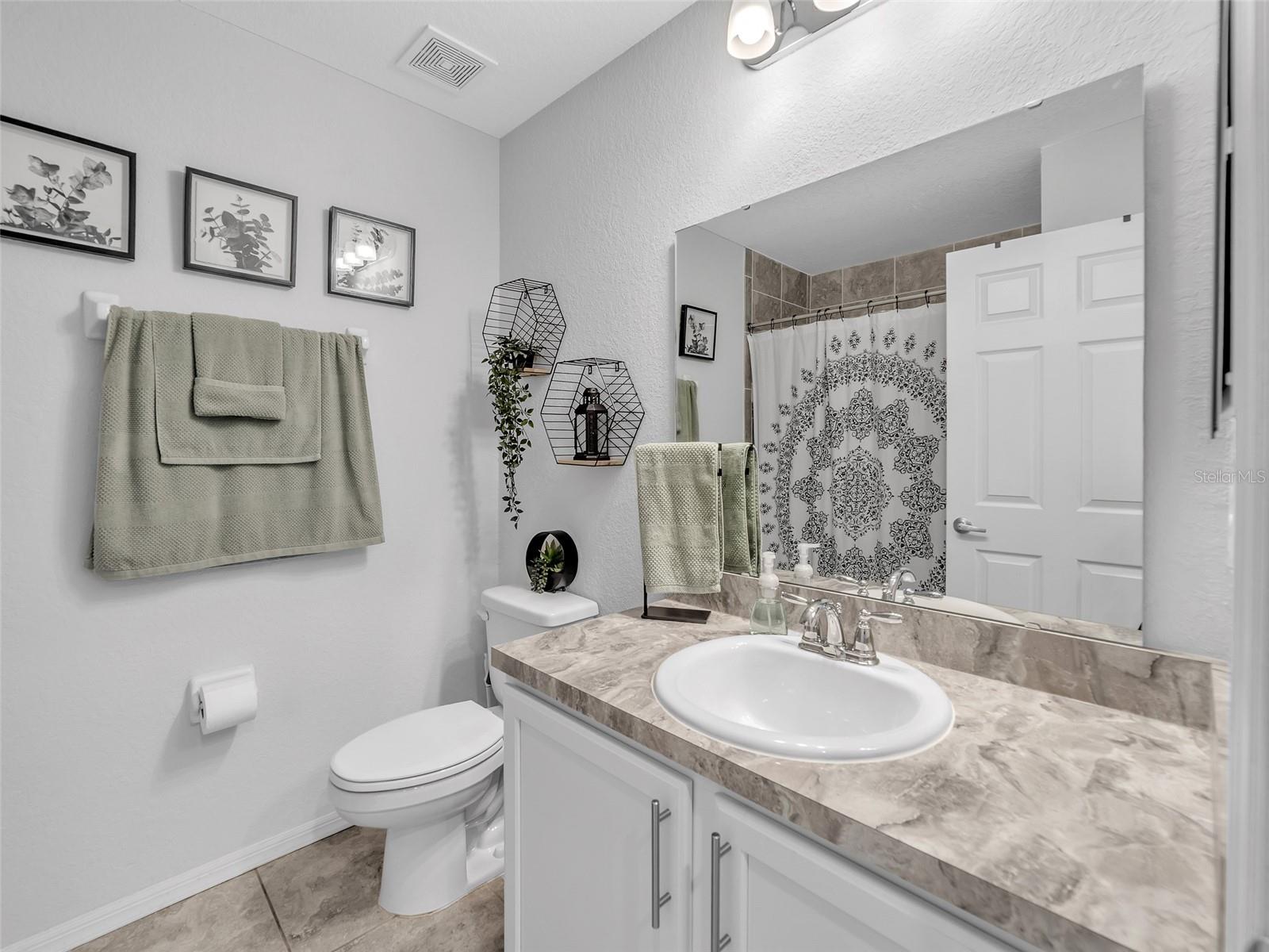 Upstairs Bathroom #2 with a Tub