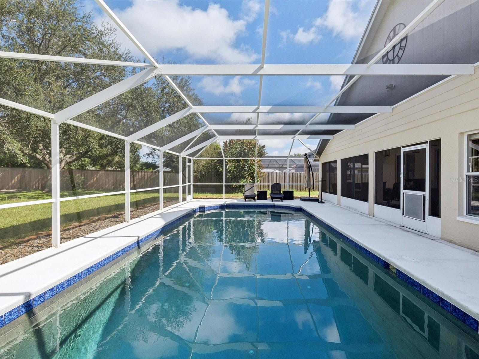 The saltwater pool has its own rescreened and patio bug (2020) enclosure.