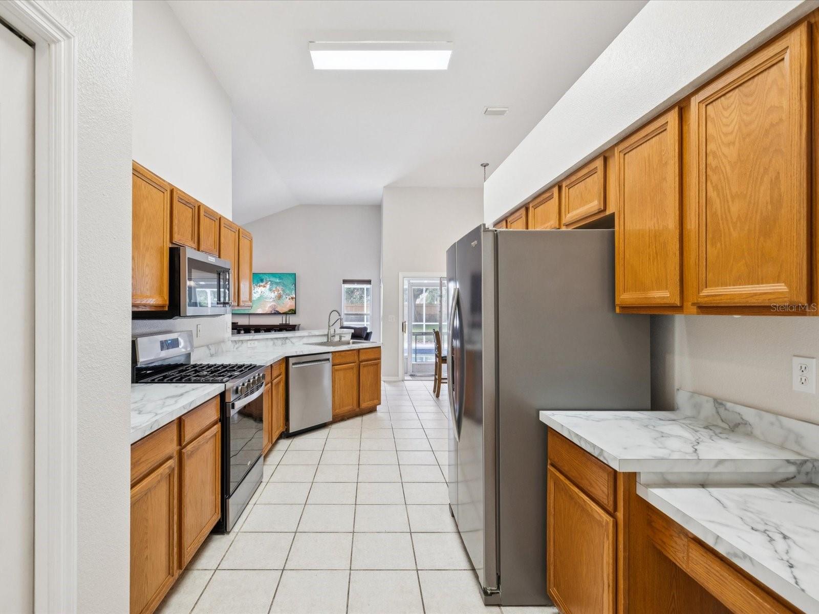 This extra long kitchen seamlessly blends utility and efficiency.