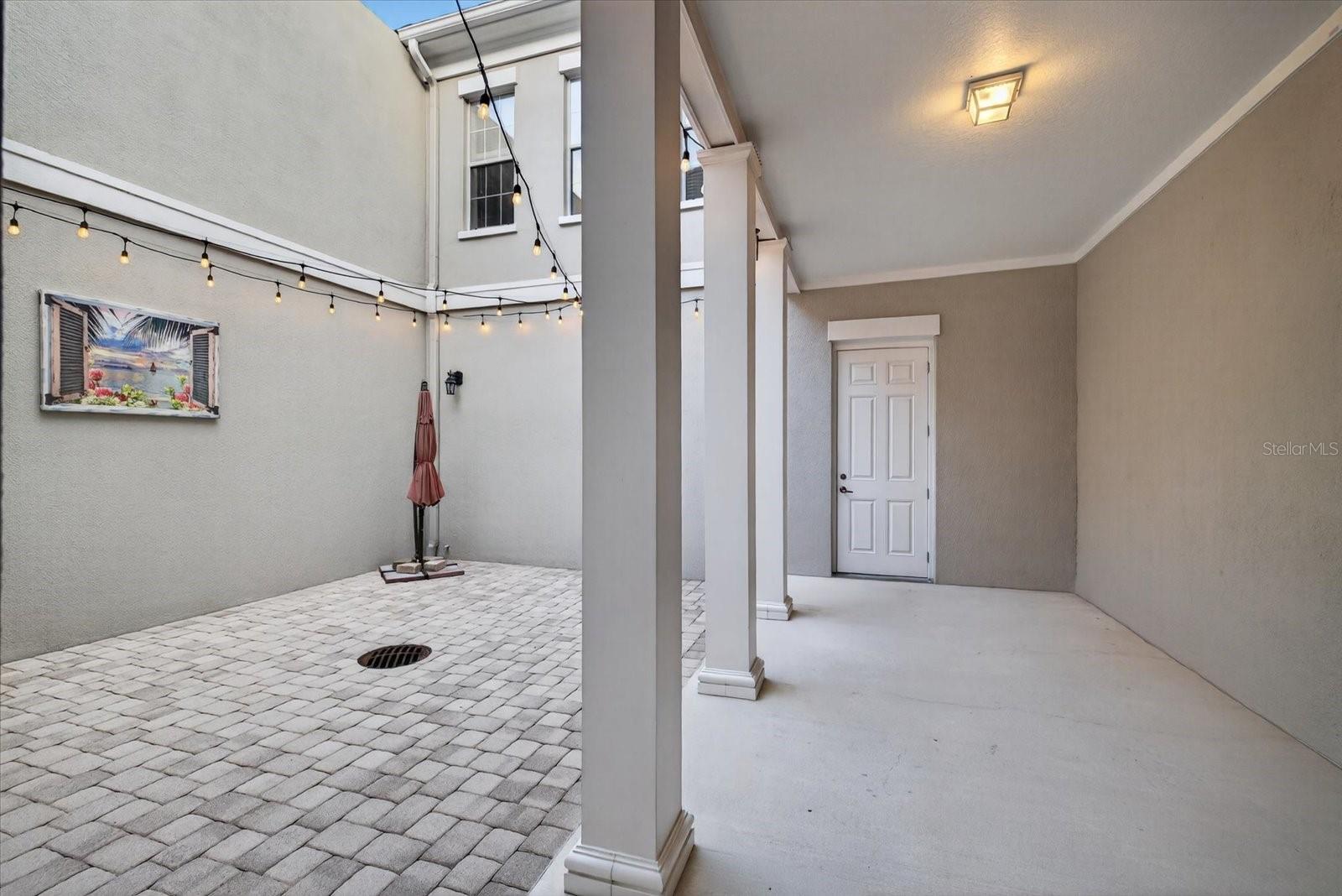 Private Courtyard between house and garage